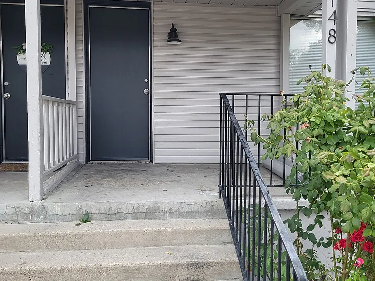 Welcoming Front Porch with seating area