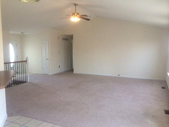 Open living room, with vaulted ceilings!