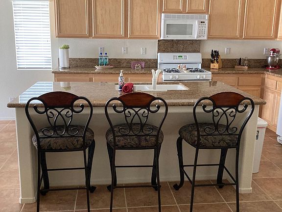 Beautiful kitchen. Very friendly for everyday and entertaining guests. Microwave/dishwasher/over/stove top/dishwasher. Counter tops are amazing. Every part of this home is a Must See.
