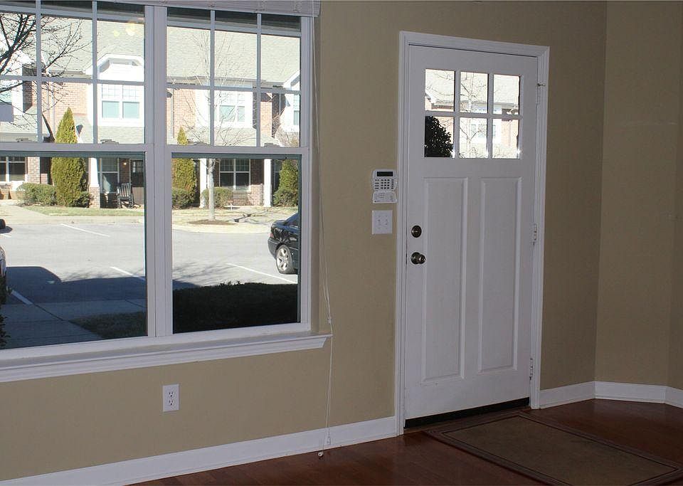 Living room facing front door.