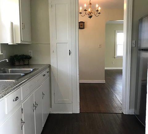 kitchen, looking into dining rm and living room