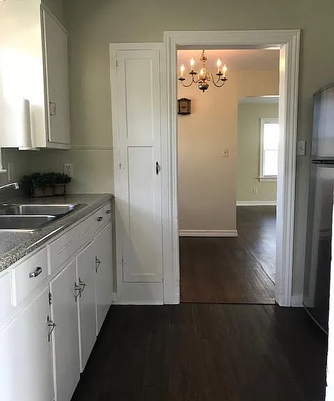 kitchen, looking into dining rm and living room