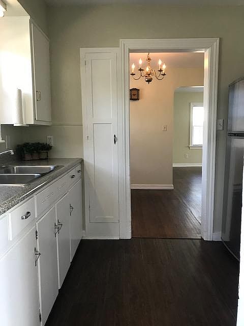 kitchen, looking into dining rm and living room