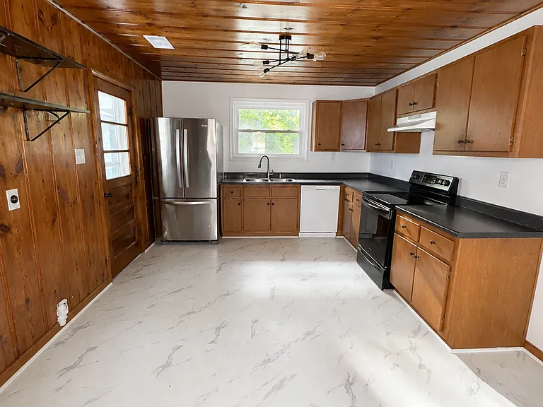 Kitchen with wide angle view.