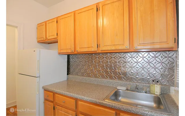 Sold by Douglas Elliman | media 11