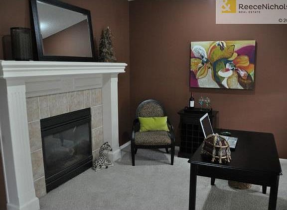 Glass French doors allows for privacy & the fireplace provides t