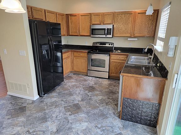 New refrigerator, microwave oven, stove w/self cleaning, dishwasher, new flooring