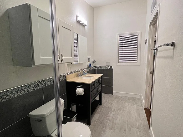 bathroom with laundry area