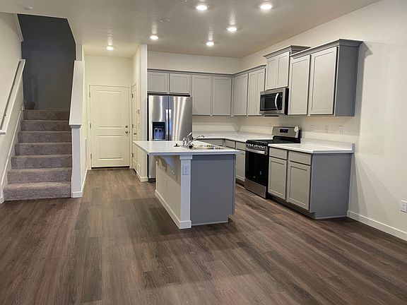 This is the 1st floor kitchen and door into the 2 car garage.