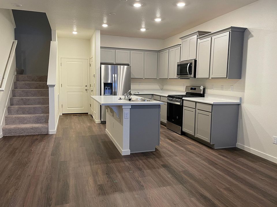 This is the 1st floor kitchen and door into the 2 car garage.