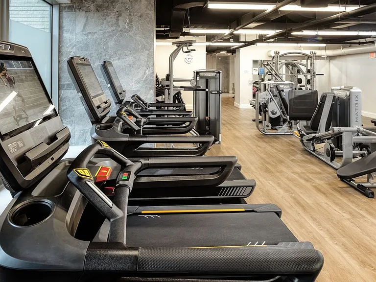 State-of-the-art fitness center with cardio equipment