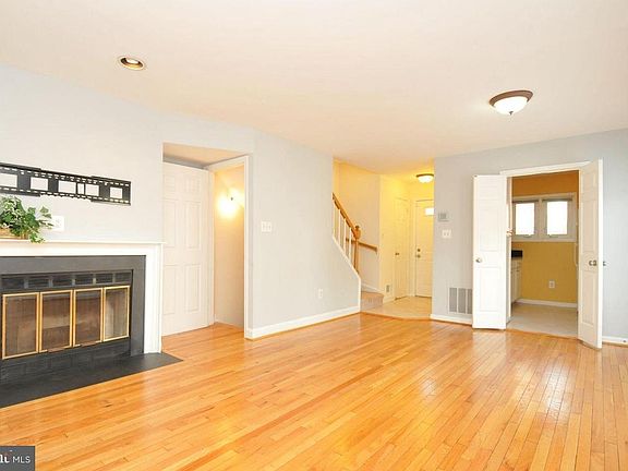 LR facing front door, 1/2 bath is to the left of the front door.