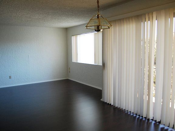 From Dining Room, view past balcony toward end of Living Roo