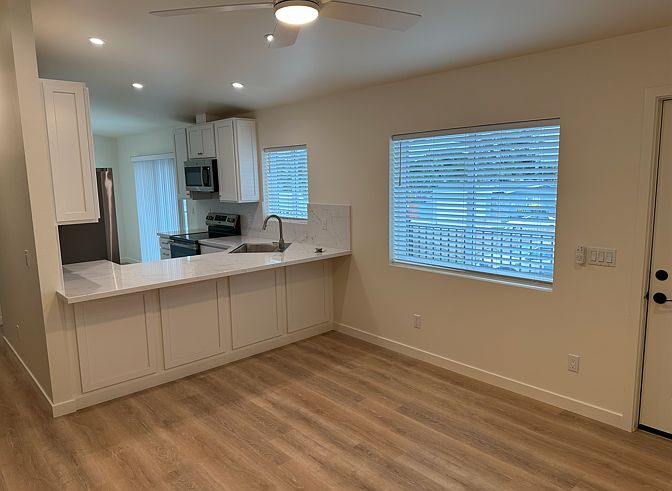 Living room looking toward kitchen