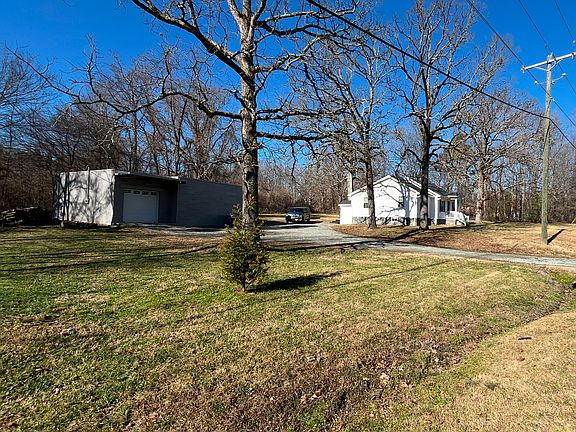 Oversized garage/shop for mechanics/woodworking/hobbies