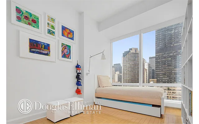 Sold by Douglas Elliman | media 11