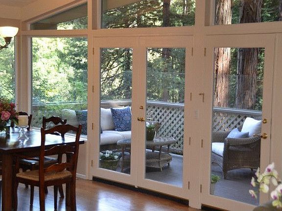 Dining area with access to kitchen and main deck.