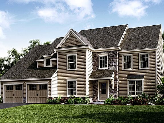 Magnolia American, shown with optional carriage style garage doors