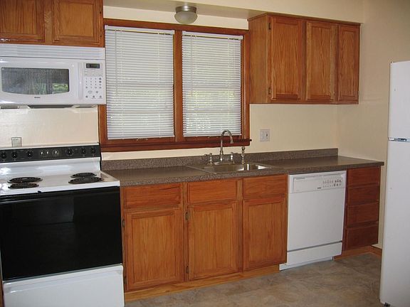 New kitchen with all appliances including refrigerator, washer/dryer
