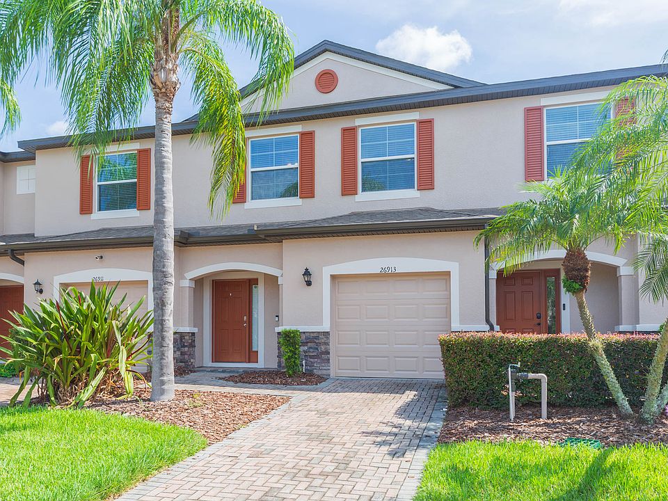 Gated neighborhood with 1 car garage and paver driveway