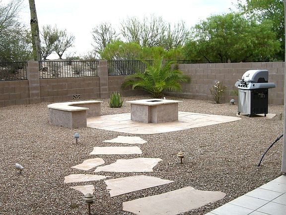 back yard fire pit and bbq area