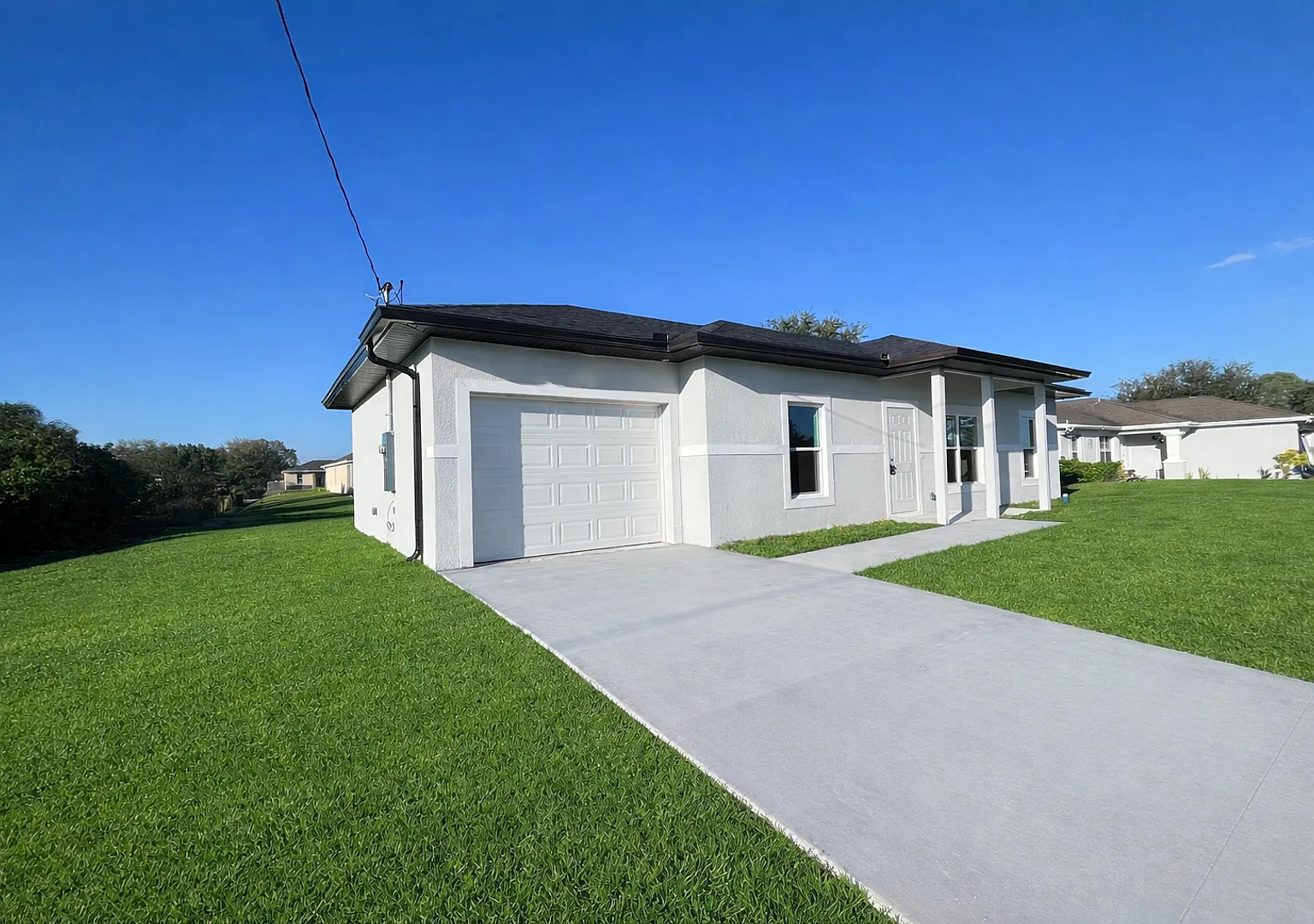 New Construction- Modern 3 Bed / 2 Bath Home In E Lehigh Acres — Photo 2
