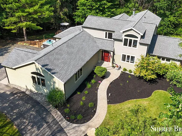 8653 Conservation St NE, Ada, MI 49301