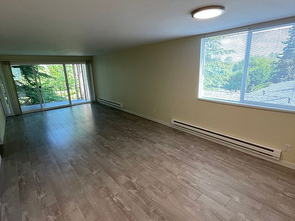 Living area with balcony facing East