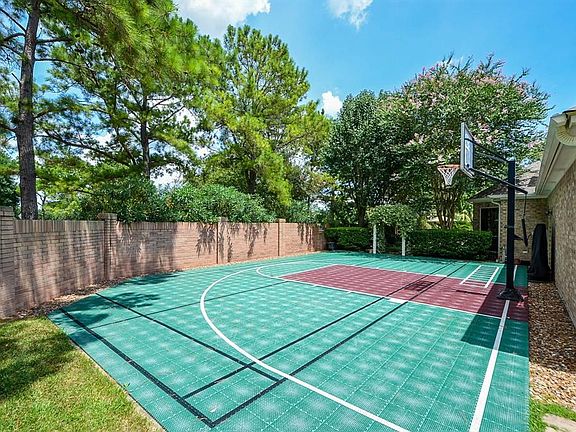 How cool is it to have your very own sports court. Special type surface is easy on the joints. Hours of enjoyment will be had on this court.