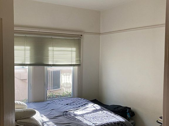 Bedroom before new paint & lighting