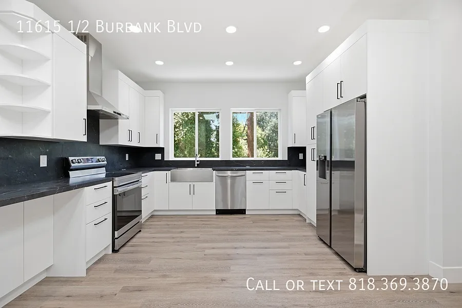 A Sleek Two-Bedroom With Two Parking Spots — Photo 4