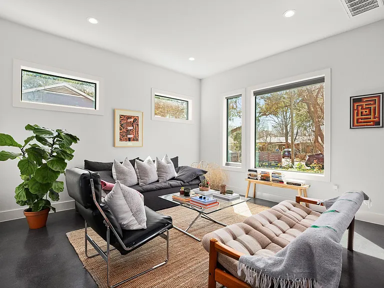 living area, opposite view. High ceilings, big windows with remote control blinds!