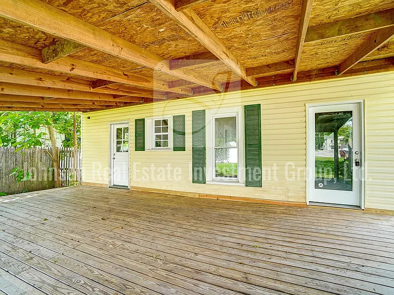 Absolutely huge covered deck _ a great place to relax outdoors.
