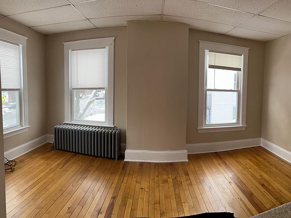 large, sunny rooms with hardwood flooring
