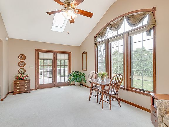 Vaulted Great Rm Exetnsion Perfect Window Wrapped Morning Room, Game Room or extension to the Great Room offers French Doors to the Poly-vinyl Deck perfect for a Summer Barbeque or leasurely afternoon.