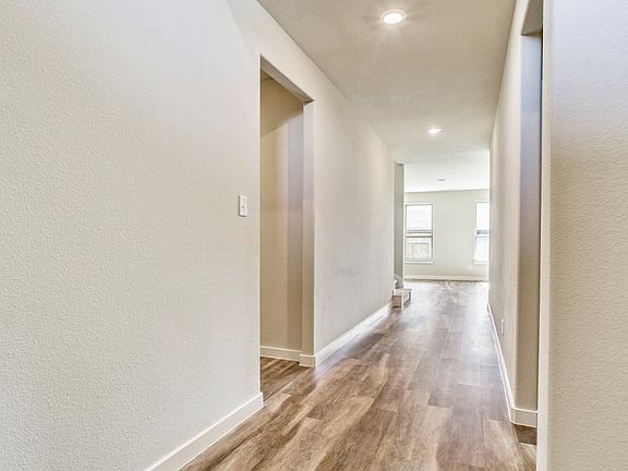 Wide foyer with high ceiling