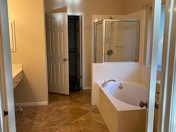 Master bathroom with walk in closet