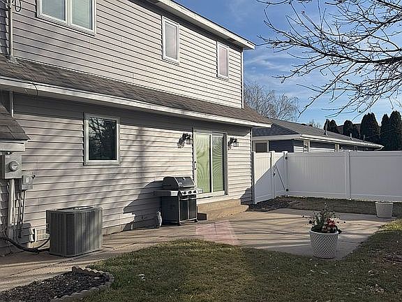 New fence and vinyl siding