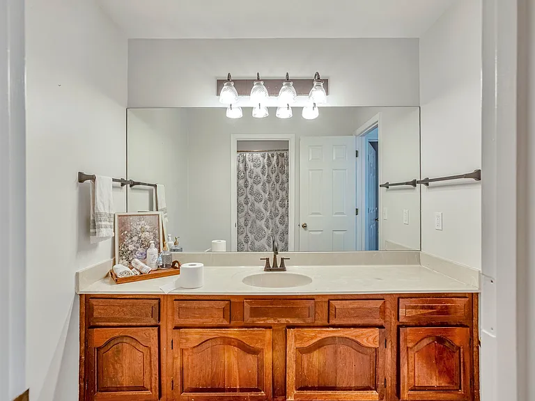 Sink and storage in upstairs bathroom