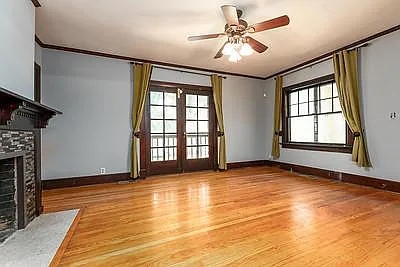 Large windows. 2 French Doors with Screens make moving easy and access to front yard.