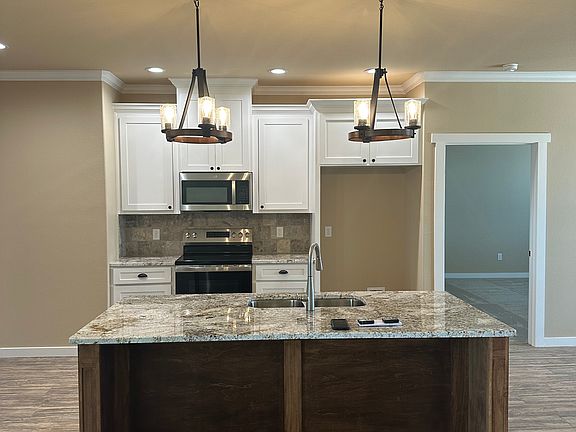 Kitchen with custom island and granite countertops