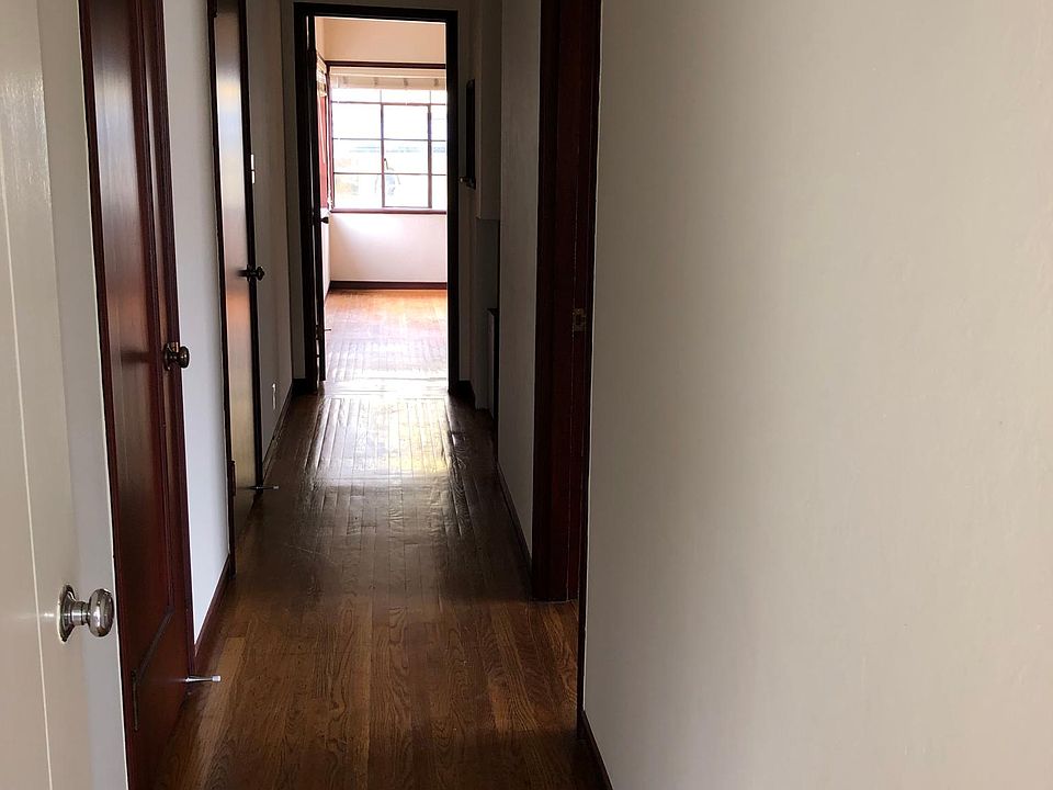 Hall from kitchen going into bedrooms