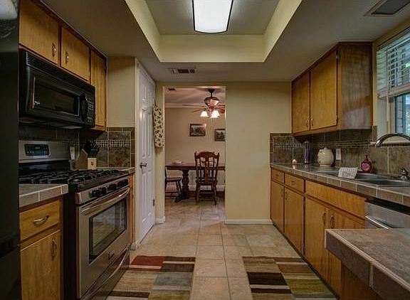 Kitchen area, and dining beyond