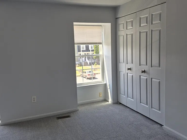 Main bedroom with double doors entry and large closet