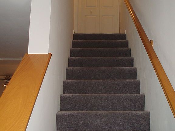 Stairs up to second floor