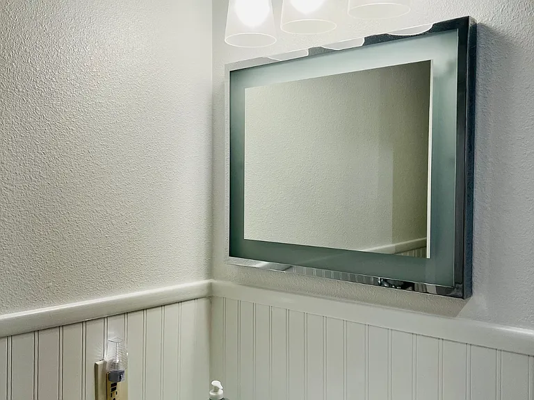 Guest bathroom mirror and lighting