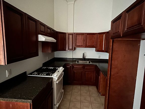 good size kitchen with an abundance of cabinets for storage & plenty of countertop space! Kitchen is open to Living Room (great for entertaining!) 
-Fridge will be delivered upon move in.