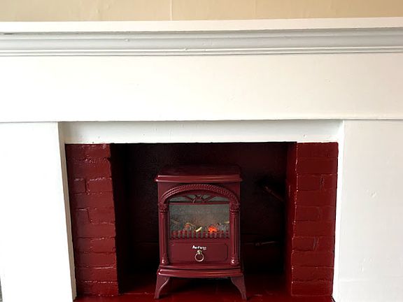 Fireplace with large mantel