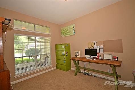 Stay organized and efficient in this private office.