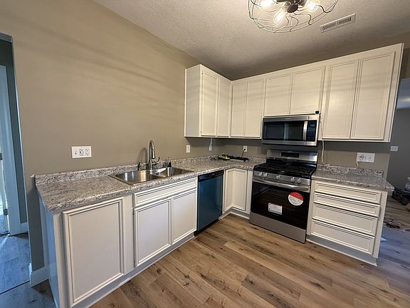 Kitchen - with brand new appliances, including a gas stove.